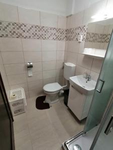 Kúpeľňa v ubytovaní Joós Apartman