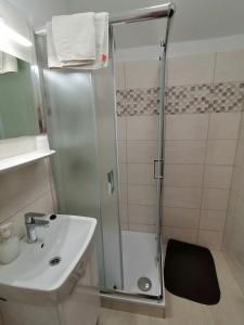 Kúpeľňa v ubytovaní Joós Apartman