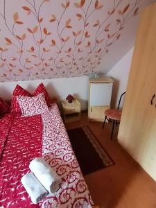 Posteľ alebo postele v izbe v ubytovaní Joós Apartman
