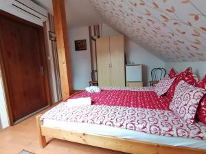 Posteľ alebo postele v izbe v ubytovaní Joós Apartman