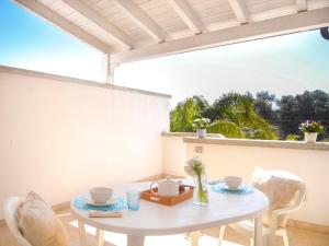A balcony or terrace at Appartamenti Via Corfù - Le vie di Omero