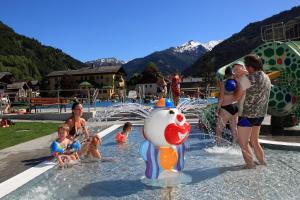 a group of people in a pool at a water park at Appartementhaus Schützenhof Schied in Grossarl