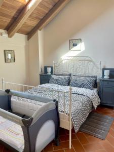 Een bed of bedden in een kamer bij La Famulenta 17