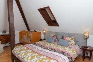 Postelja oz. postelje v sobi nastanitve B&B L'Eden