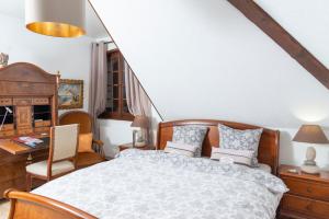 Postelja oz. postelje v sobi nastanitve B&B L'Eden