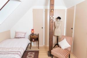 Postelja oz. postelje v sobi nastanitve B&B L'Eden