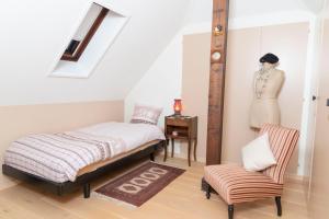 Postelja oz. postelje v sobi nastanitve B&B L'Eden