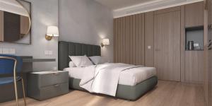 Katil atau katil-katil dalam bilik di Maralia Hotel