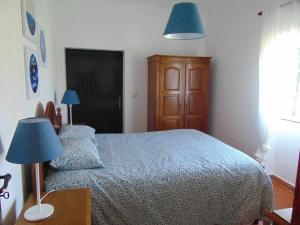 Postel nebo postele na pokoji v ubytování Casa de Granito Charmosa
