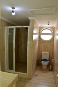 a bathroom with a shower and a toilet at BEACH SIDE in Puerto de Mogán