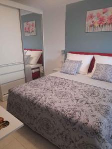 Posteľ alebo postele v izbe v ubytovaní Szalai Apartman