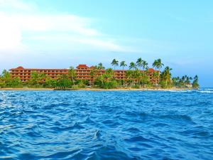 a view of the resort from the water at Hikka Tranz by Cinnamon in Hikkaduwa