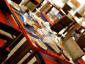 a group of utensils sitting on top of a table at Hikka Tranz by Cinnamon in Hikkaduwa