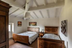 Postelja oz. postelje v sobi nastanitve Villa Liberty Mugello - Affitti Brevi Italia