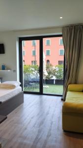 Postel nebo postele na pokoji v ubytování Antica Campione Rooms & Hostel