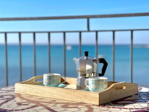 Coffee and tea making facilities at Viva Vista Mare Bilo Secondo Piano Vista