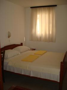 Cama o camas de una habitación en Apartments Medin Danilo