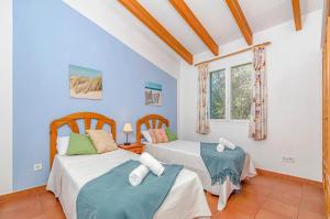 Ένα ή περισσότερα κρεβάτια σε δωμάτιο στο Villa Jasmin