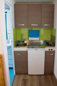 Köök või kööginurk majutusasutuses Sardinia MongaHouse