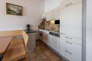 Köök või kööginurk majutusasutuses Chalet Central - Top Cc8