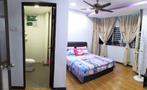 Postel nebo postele na pokoji v ubytování Sekinchan Paddy via Seaview Home 高楼 看海 稻田 民宿