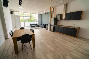 A television and/or entertainment centre at Cinema Zeus Studios - by Avelink