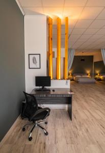 A television and/or entertainment centre at Cinema Zeus Studios - by Avelink