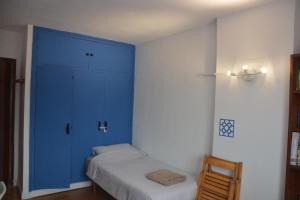Postel nebo postele na pokoji v ubytování Superviews, parking 24h vigilado incluido y Netflix en habitación independiente con baño privado en apartamento particular, Français&English