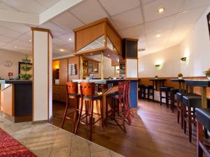 Kuchyň nebo kuchyňský kout v ubytování ACHAT Hotel Darmstadt Griesheim