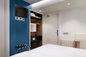 Postel nebo postele na pokoji v ubytování Hotel Parma