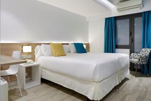 Cama o camas de una habitación en Hotel Parma