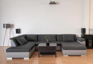 A seating area at Cinema Zeus Studios - by Avelink