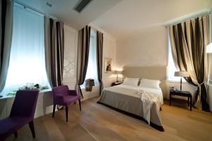Кровать или кровати в номере The Ashbee Hotel