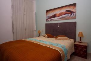 Postel nebo postele na pokoji v ubytování Hotel Leiriense