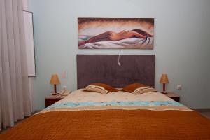 Postel nebo postele na pokoji v ubytování Hotel Leiriense