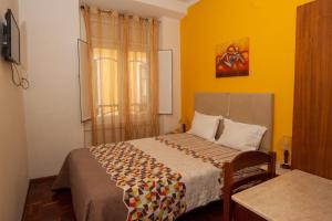 Postel nebo postele na pokoji v ubytování Hotel Leiriense