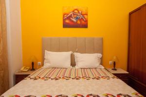 Postel nebo postele na pokoji v ubytování Hotel Leiriense