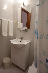 Koupelna v ubytování Hotel Leiriense