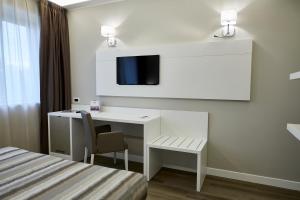 A television and/or entertainment centre at La Perla