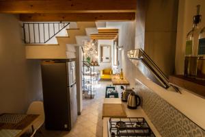 Kuchyňa alebo kuchynka v ubytovaní FONTANE APARTMENTS