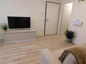 TV a/nebo společenská místnost v ubytování Residence La Mason