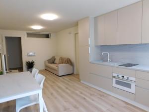 Kuchyň nebo kuchyňský kout v ubytování Residence La Mason