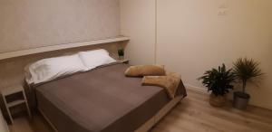 Postel nebo postele na pokoji v ubytování Residence La Mason