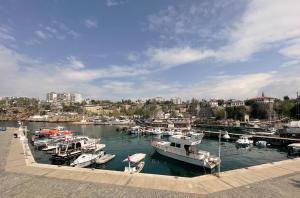 a bunch of boats are docked in a harbor at Hotel Mille Kaleiçi in Antalya