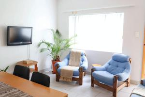 TV a/nebo společenská místnost v ubytování The Nook