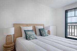 Ένα ή περισσότερα κρεβάτια σε δωμάτιο στο Pour un agréable séjour en bord de mer pour 4 pers