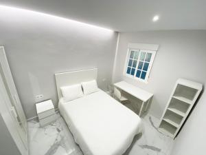 Posteľ alebo postele v izbe v ubytovaní Apartamento San Félix, Playa La Caleta