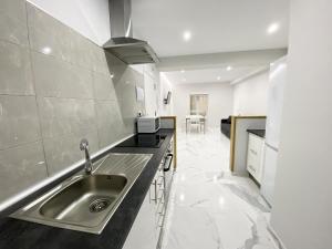 Kuchyňa alebo kuchynka v ubytovaní Apartamento San Félix, Playa La Caleta
