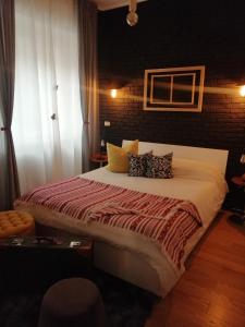 Postel nebo postele na pokoji v ubytování suite del borgo