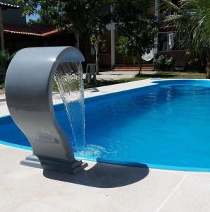 A piscina localizada em Espaço verde Hospedagem ou nos arredores